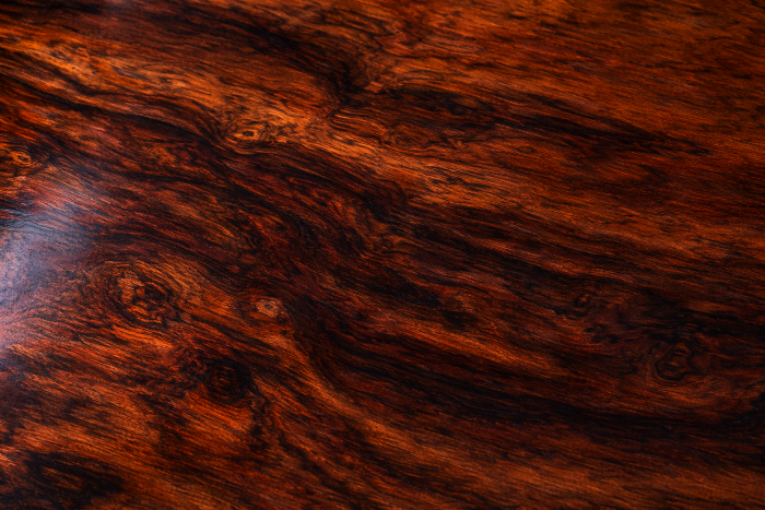 Rosewood antique furniture grain close up showing rich figured timber